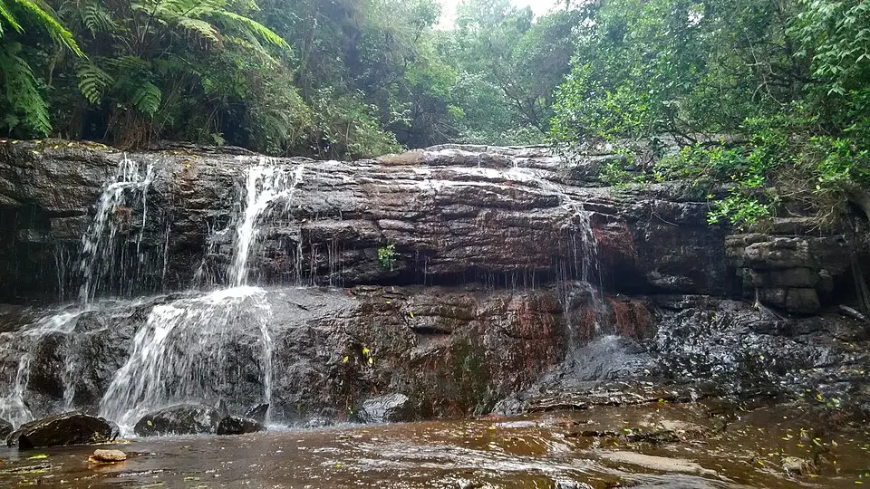 Fairy Falls cascading through mossy rocks in Kodaikanal