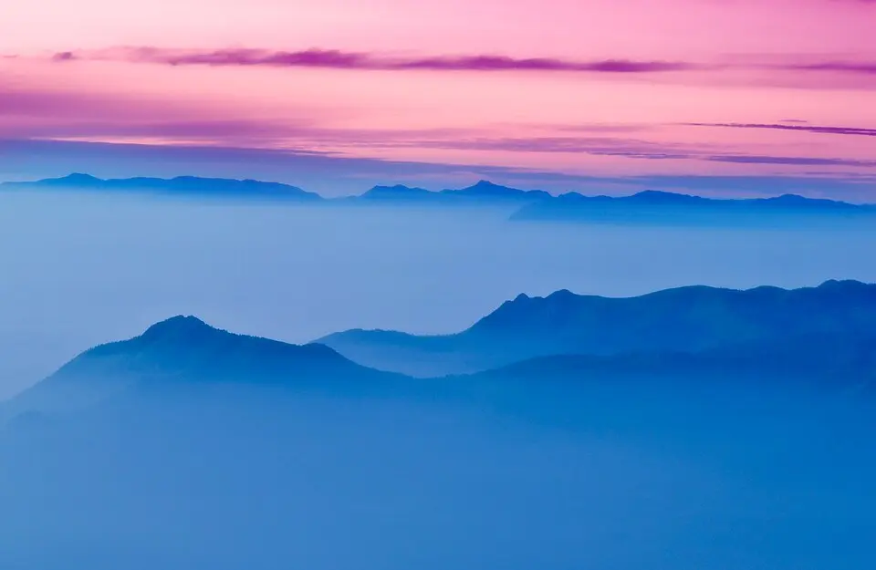 Sea of clouds filling Green Valley (Suicide Point) at sunset view, Kodaikanal