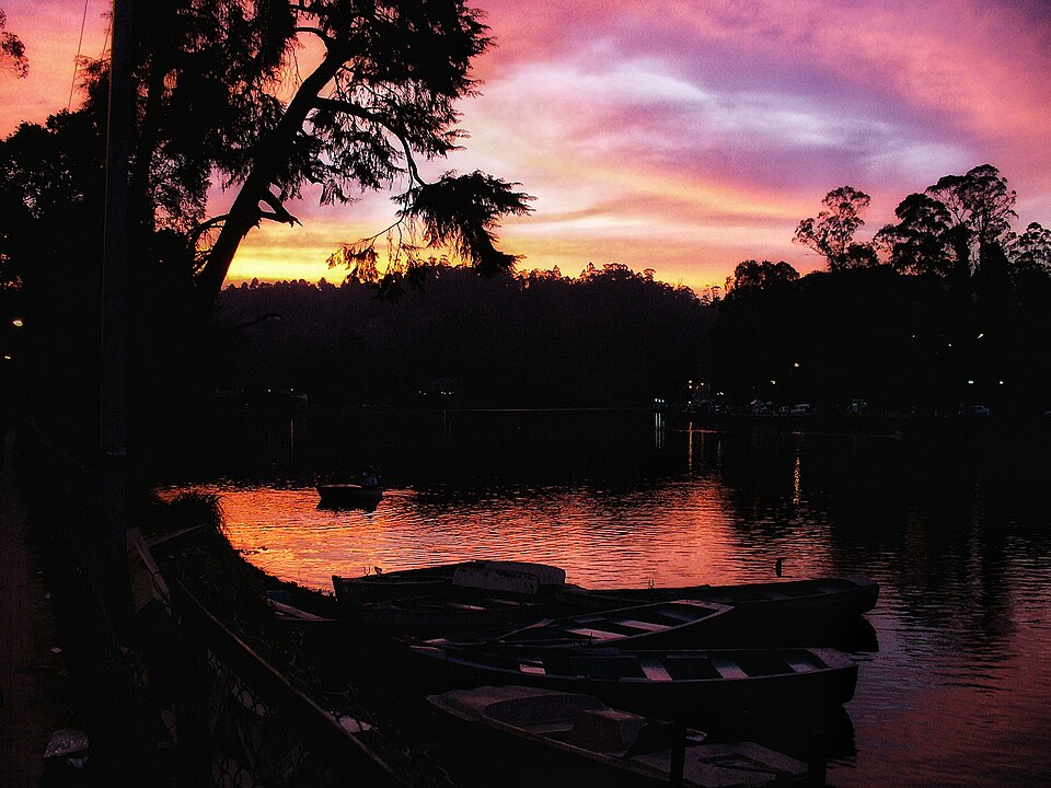 Golden sunset light over lake viewed from Kodaikanal lake view point