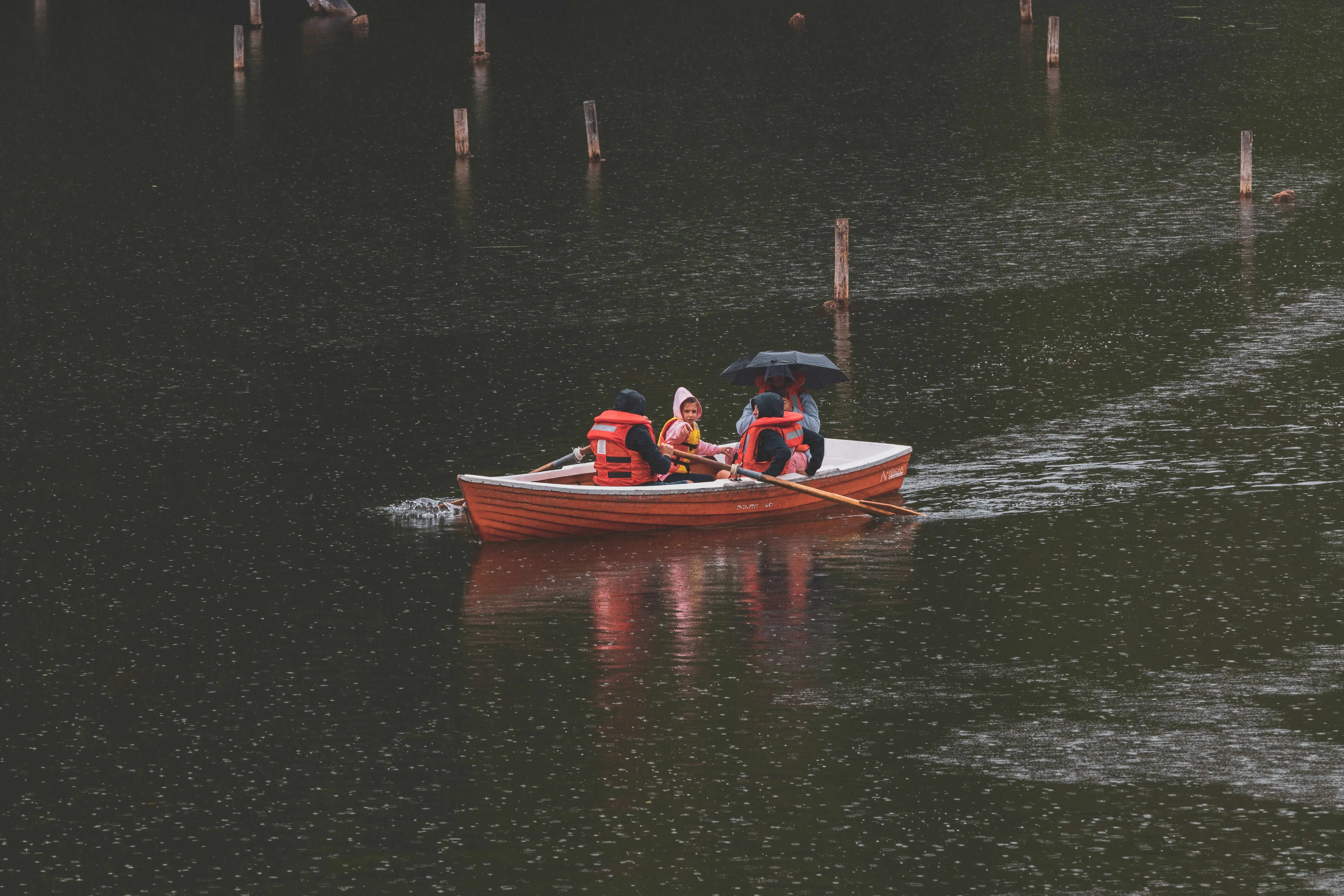 Visitors enjoying a row boat ride at Kodaikanal Lake