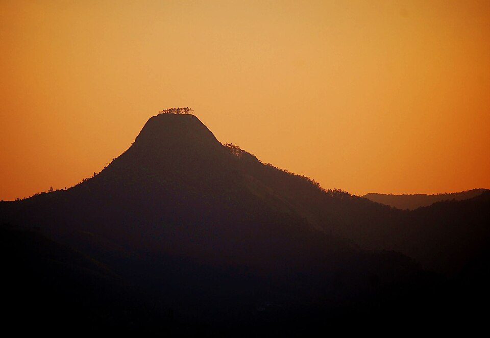 Western Ghats mountain range at golden hour seen from Perumal Peak, the highest sunrise point in Kodaikanal