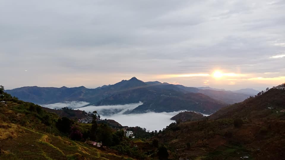 Clouds rolling below the Perumal Peak summit at dawn, Palani Hills, Tamil Nadu