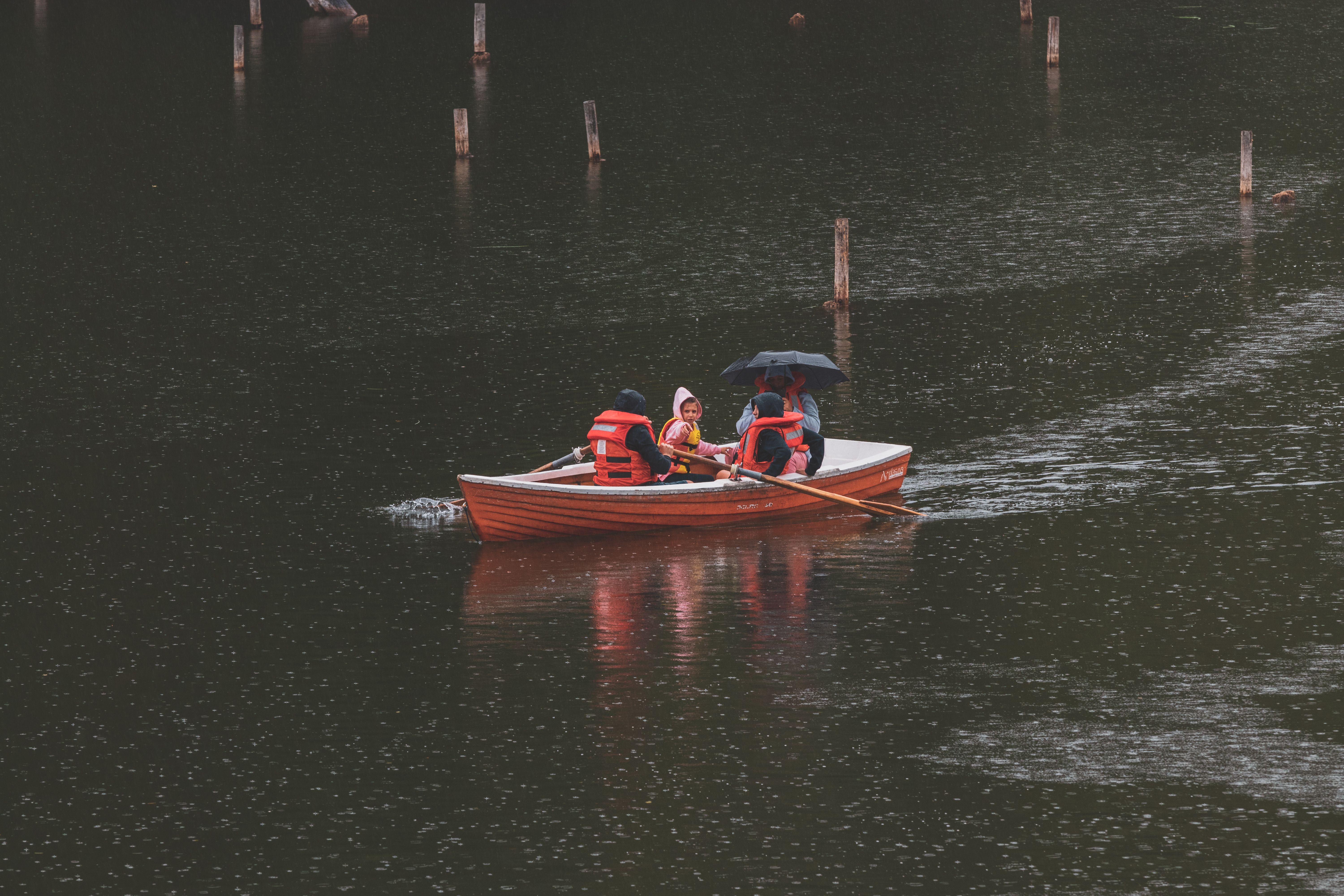 Visitors enjoying a row boat ride at Kodaikanal Lake