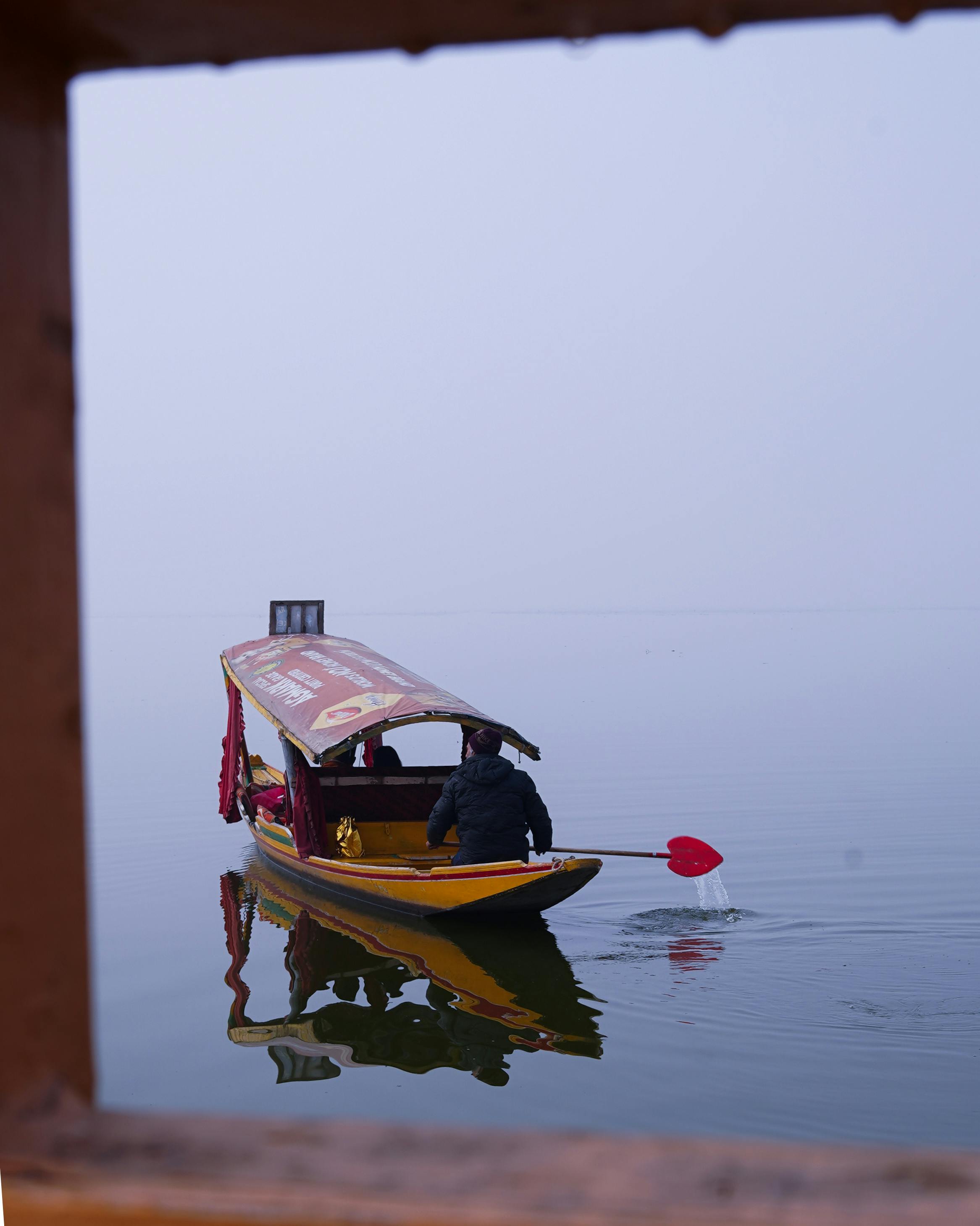 Visitors enjoying a shikara boat ride at Kodaikanal Lake