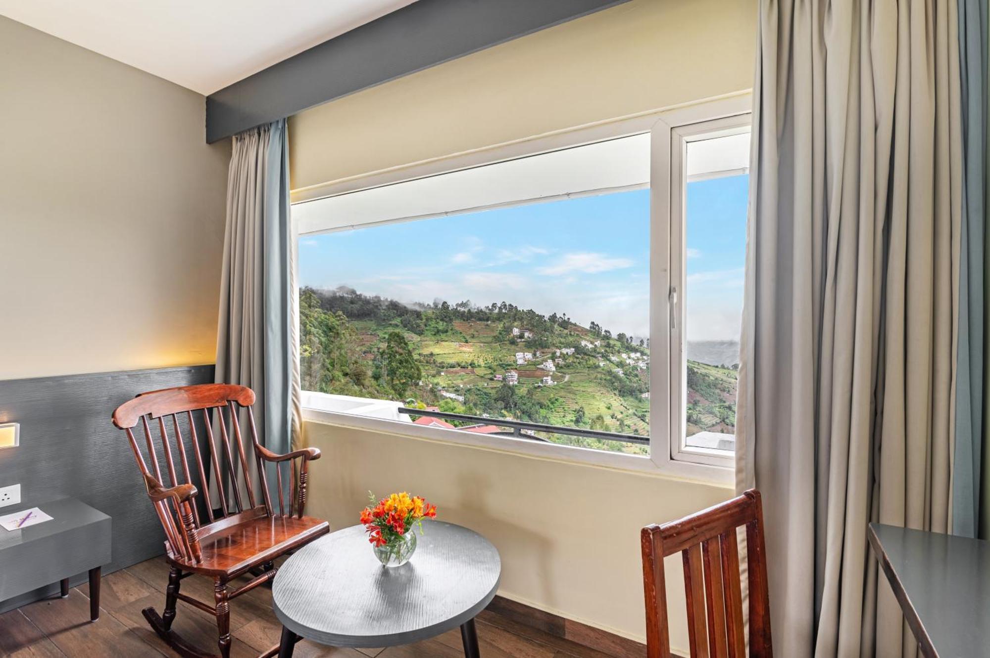 Sweeping valley view from the upper floors of Sterling Kodai Valley resort, Palani Hills