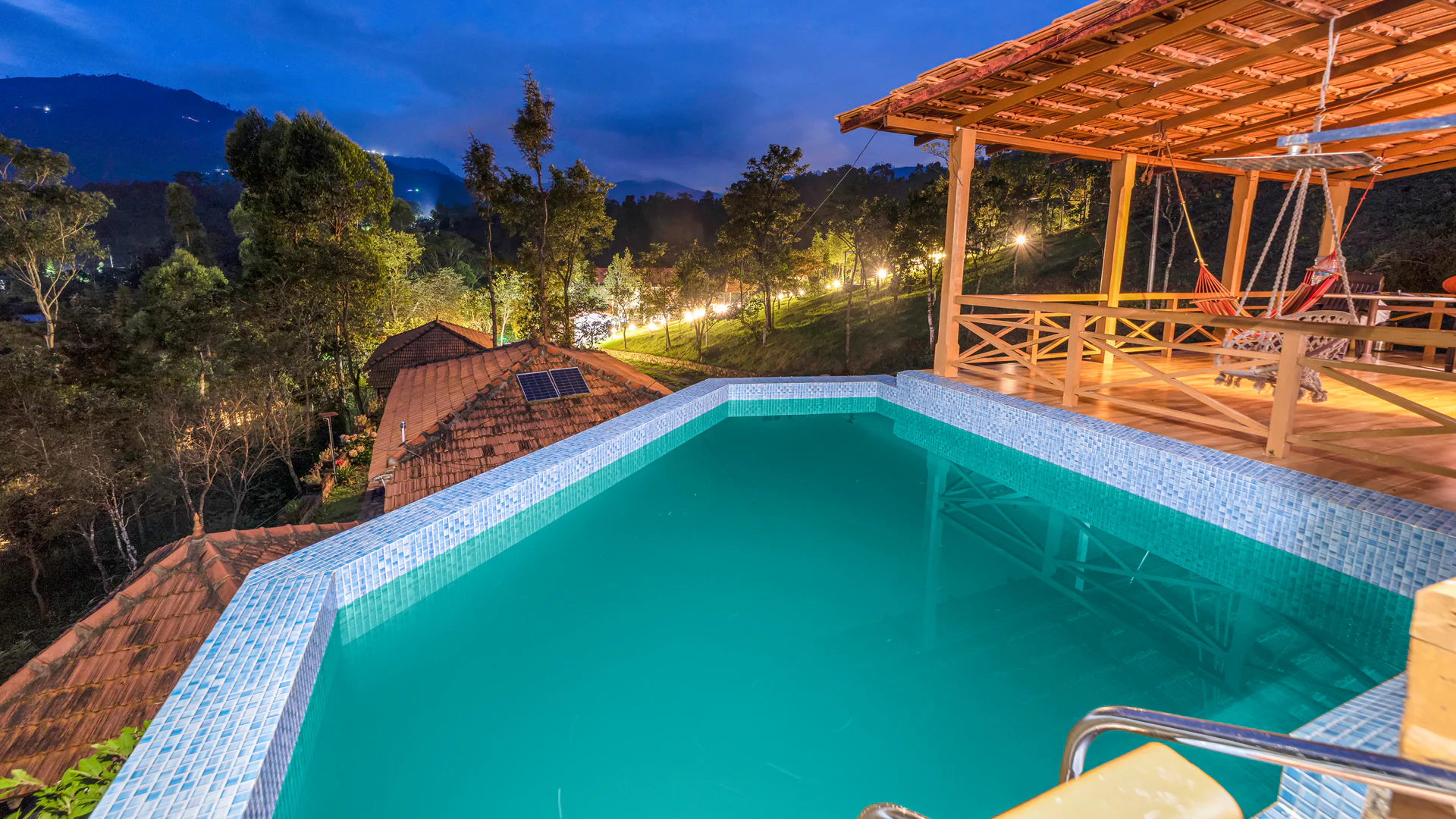 Rooftop swimming pool overlooking the valley at Zacs Valley Resort, Perumal Malai Road, Kodaikanal